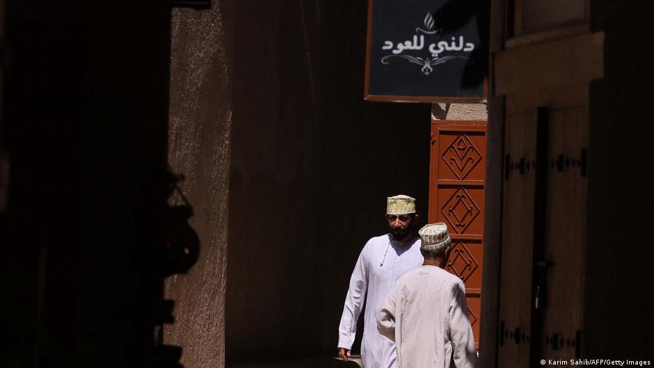 Omanis walk in Bahla Fort, one of four historical forts located at the foot of the Green Mountain highlands, and the only fort in the country designated a UNESCO Heritage Site