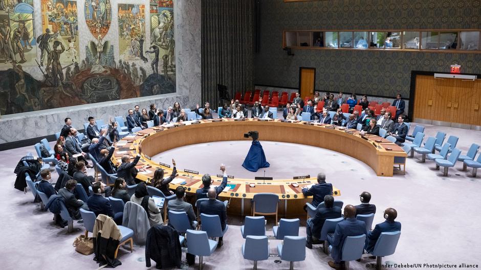 Representatives vote on a draft resolution during a Security Council meeting at UN headquarters in New York to terminate the UNITAMS mandate