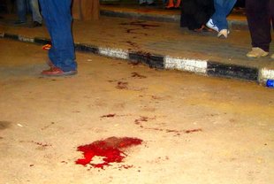 A puddle of blood on the street after the clashes on Sunday (photo: Joseph Mayton)