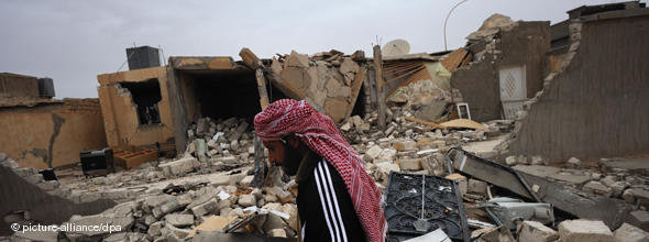 Destroyed building in Adjdabiya (photo: dpa)