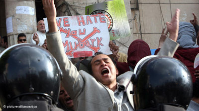 Young protester in Cairo (photo: photo alliance/dpa)