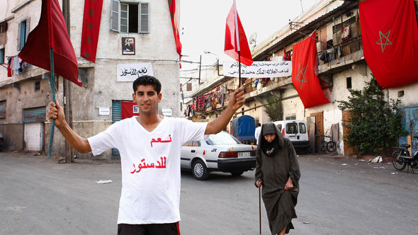 A man wearing a t-shirt that reads 