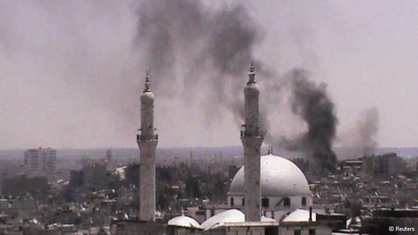 Blick auf die zertsörte Stadt Homs; Foto: Reuters