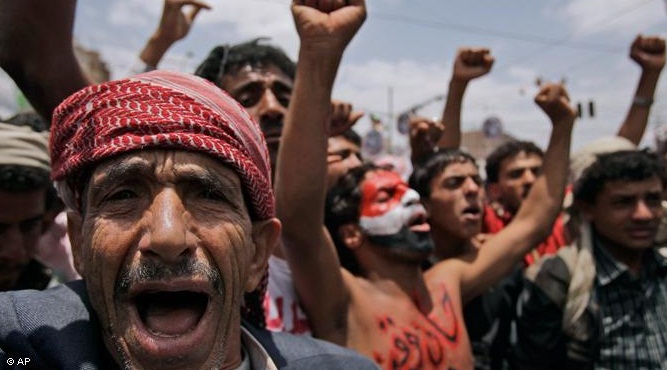 Yemeni opposition protesters celebrate the departure of head of state Ali Abdullah Saleh to attend a clinic in Saudi Arabia. Saleh was injured in a grenade attack on the presidential palace