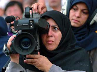 Camerawoman working on a film set