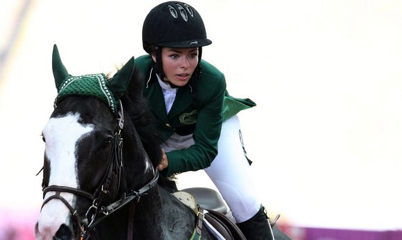 Dalma Rushdi Malhas of Saudi Arabia rides Flash Top Hat at the Singapore 2010 Youth Olympic Games (photo: picture-alliance/dpa)