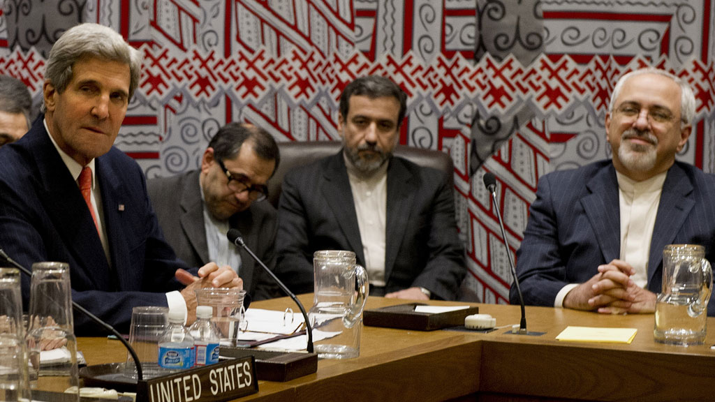 US Secretary of State John Kerry (L) and Iran's Foreign Minister Mohammad-Javad Zarif (R) attend a meeting of the five permanent members of the United Nations Security Council plus Germany about Iran's nuclear program September 26, 2013 on the sidelines of the General Assembly at UN headquarters in New York (photo: Stan Honda/AFP/Getty Images)