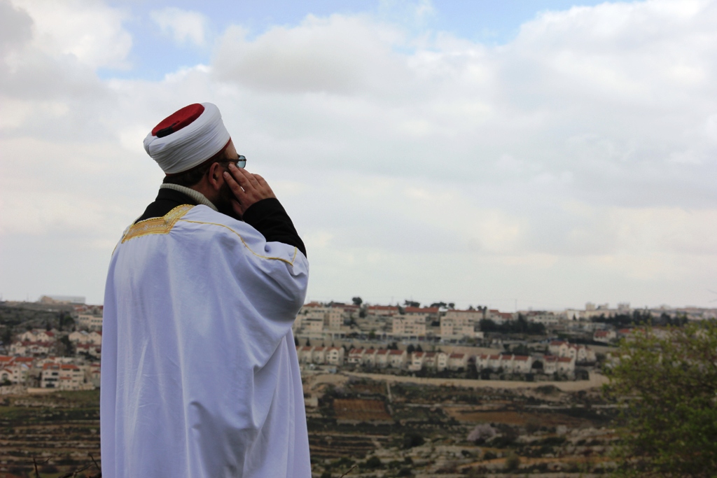 جدارية "هنا أرض كنعان" في الأراضي الفلسطينية، الصورة مهمد حامد