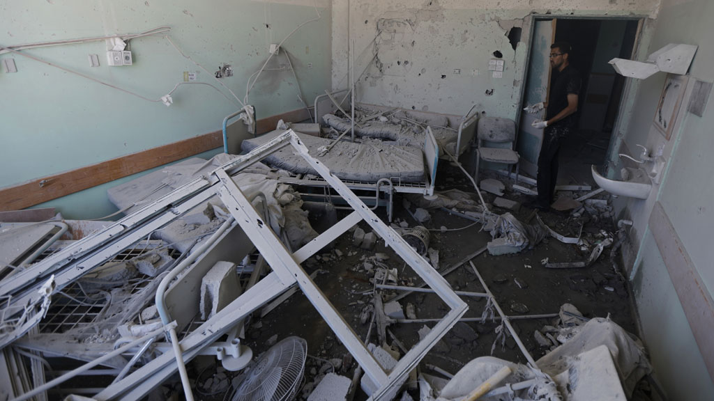 Damage sustained by al-Aqsa Martyrs Hospital in Deir al-Balah, Gaza, on 21 July 2014 (photo: MOHAMMED ABED/AFP/Getty Images)