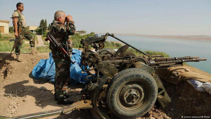 Members of the Kurdish Peshmerga at Mosul Dam in Iraq (photo: picture-alliance/AP)