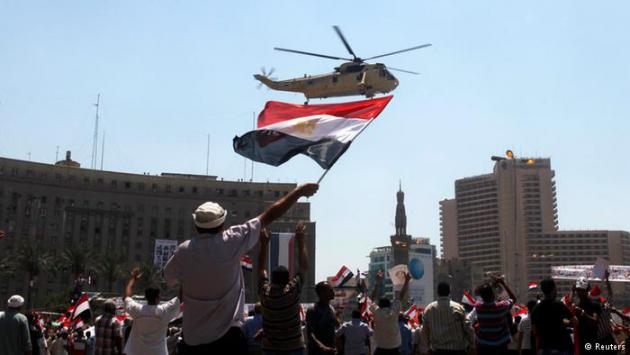 People celebrating the overthrow of President Mohammed Morsi (photo: Reuters)