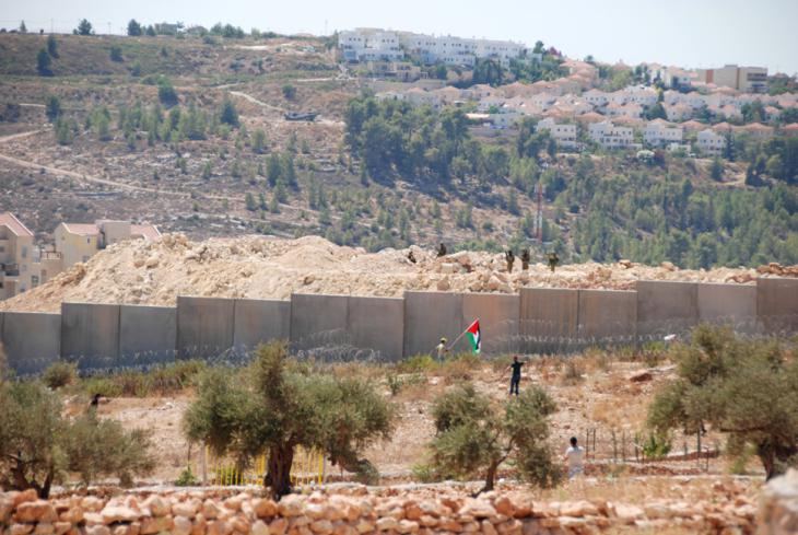 Palestinians in Bil'in protesting against the barrier and Israel's settlement policy (photo: Laura Overmeyer)