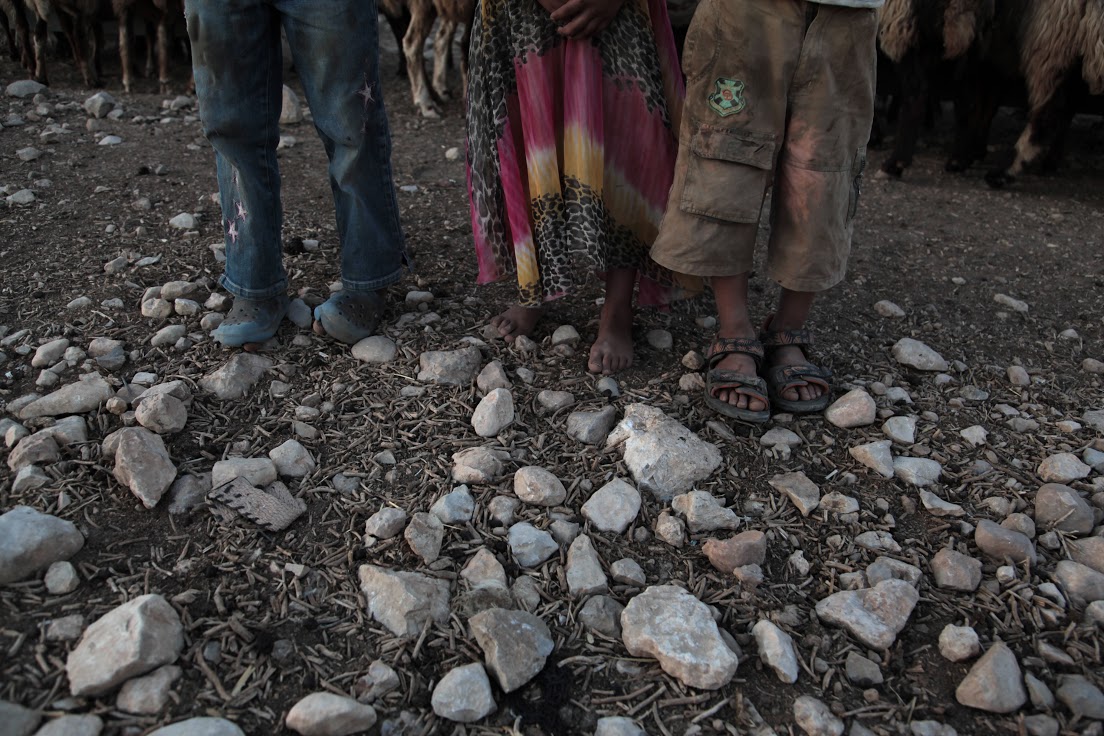 The tattered clothes of Bedouin children, Al-Maleh, West Bank, October 2014 (photo: Mohammad Alhaj)