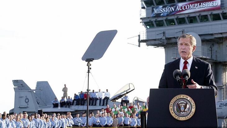 George W. Bush declares the Iraq War over on 1 May 2003 (photo: S. Jaffe/AFP/Getty Images)