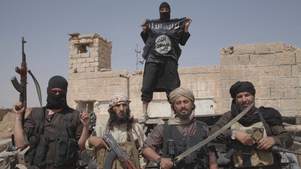 Islamic state fighters on the border between Syria and Iraq, July 2014 (photo: picture-alliance/Zuma Press/M. Dairieh)