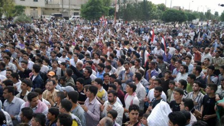 People demonstrating in Homs, Syria, March 2011 (photo: AP)