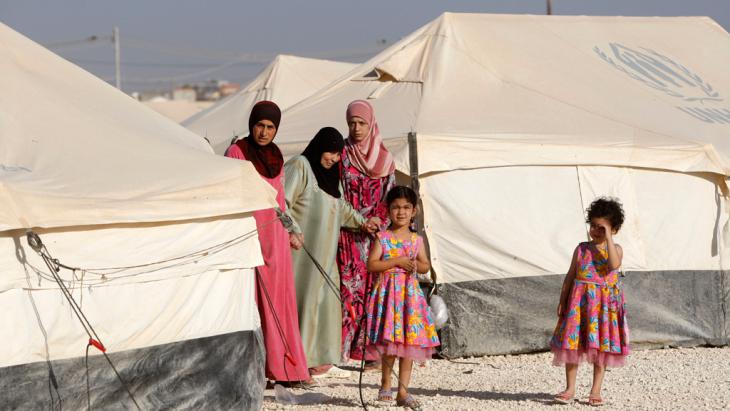 Women and children in Zaatari refugee camp (photo: Getty Images)