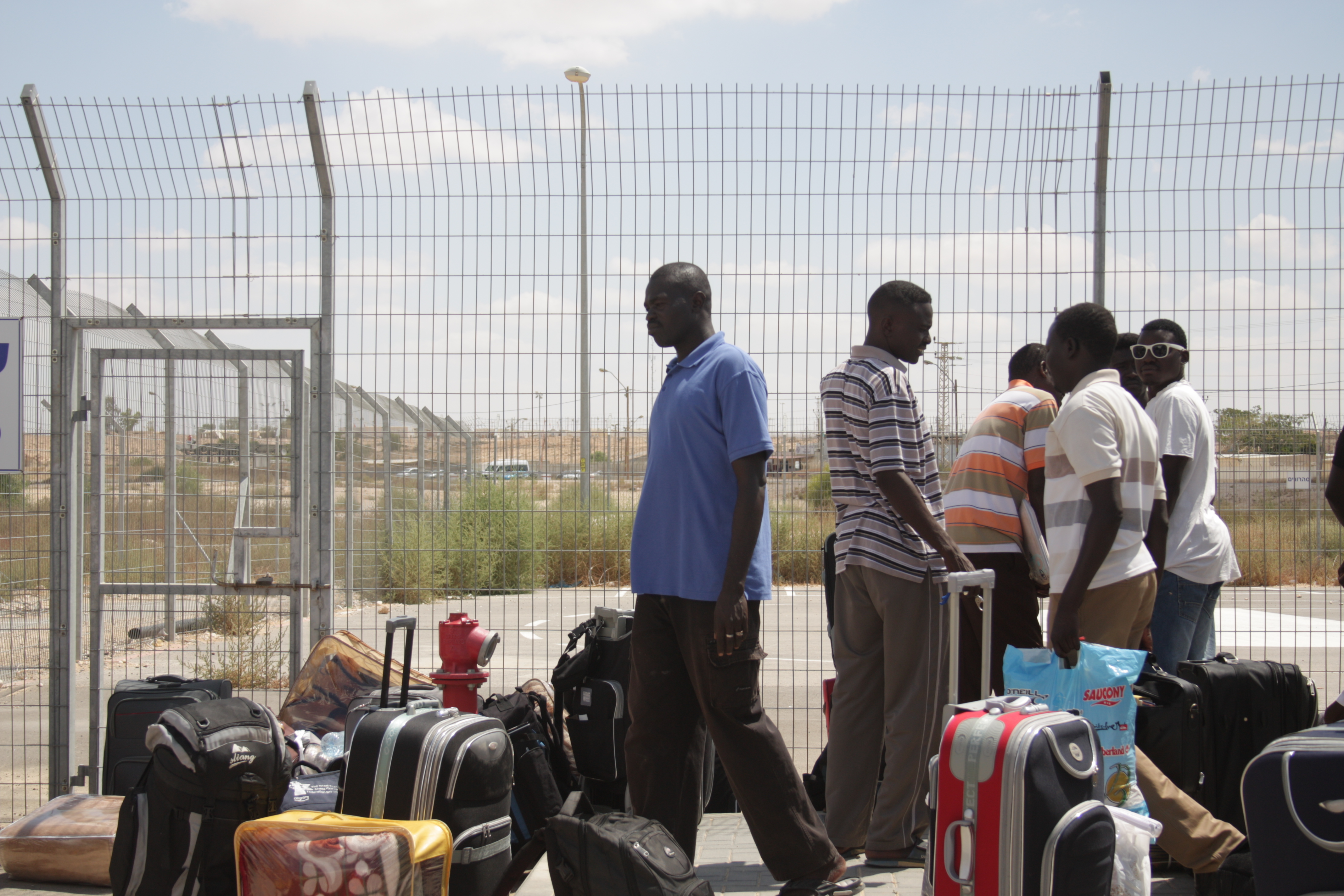 Refugees outside Holot (photo: Ylenia Gostoli)