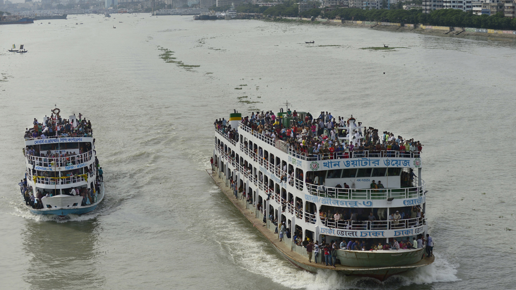 Reisende auf dem Weg zum Eid ul-Fitr-Fest zum Ende des Ramadan 2014 in Bangladesch; Foto: Getty Images/AFP/Munir uz-Zaman