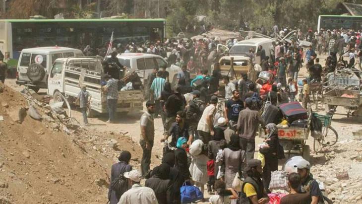 Evacuating Daraya (photo: Reuters/Sana)