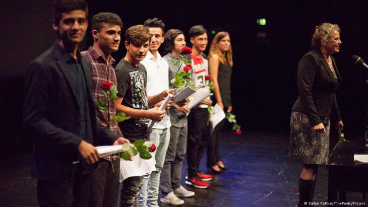 Poetry Project participants on stage with Susanne Koelbl (photo: 