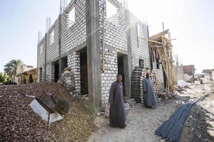 Father Filtawos stands in front of the altar of his church in Ezbeth Raflah (photo: Flemming Weiss-Andersen)