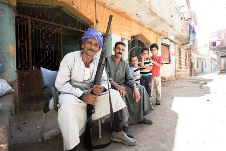 Christians guarding the church in Ezbeth Raflah (photo: Flemming Weiss-Andersen)