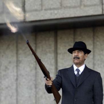 Iraq′s former dictator Saddam Hussein during a military parade in Baghdad following the Gulf War in 1991 (photo: Reuters)