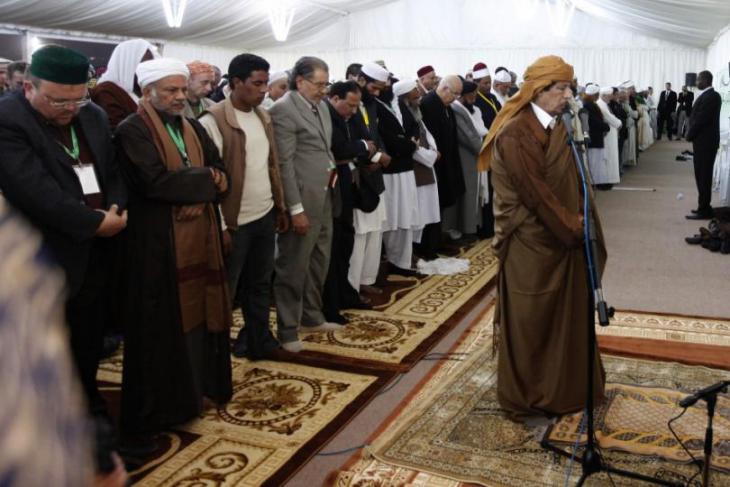 Muammar Gaddafi in February 2011 during prayers in Tripoli to mark the Prophet′s birthday (photo: Reuters)