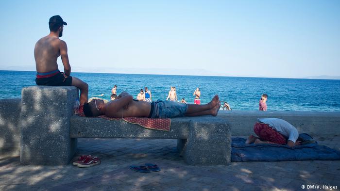 Young men on the seafront, Lesbos