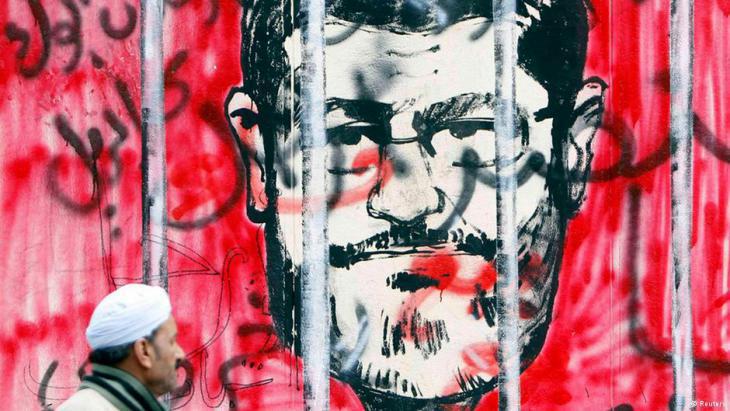 Graffiti in Cairo showing former Egyptian President Mohammed Morsi behind bars (photo: Reuters)