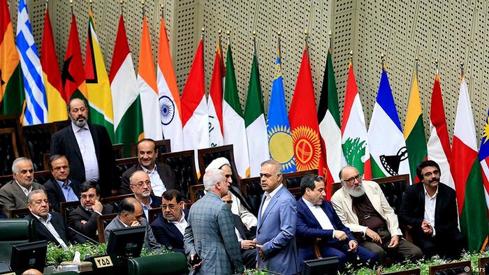 Flags line the parliamentary chamber for the inauguration of the Iranian president