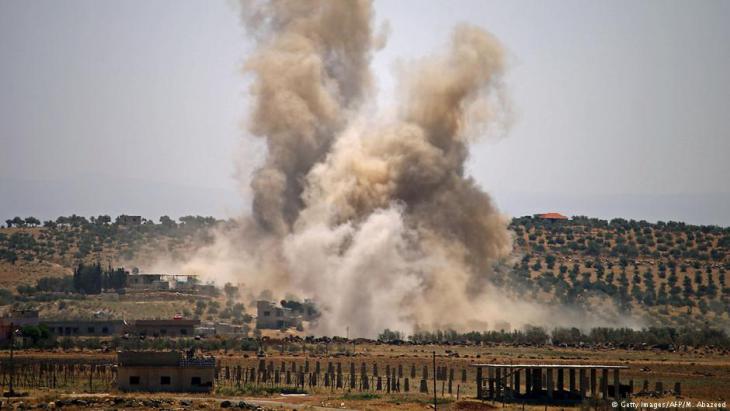 Air strikes in the Syrian province close to the Syrian-Jordan border on 8 July 2018 (photo: Getty Images/AFP)