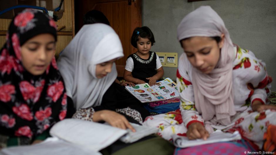 Children study at a temporary education centre inside a house in Anchar, Srinagar, 20 September 2019 (photo: Reuters/D. Siddiqui) 