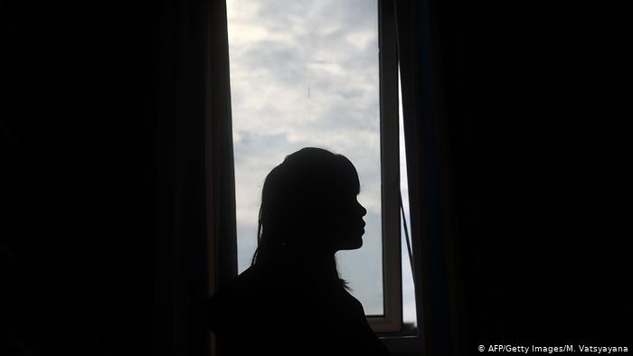 Silhouette of a young woman