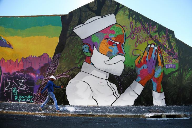 The Woodstock district of Cape Town, South Africa, is known for being hip and is one of the best street art locations in South Africa. Here, a wall painting shines with all its colours and grace in the multicultural neighbourhood.