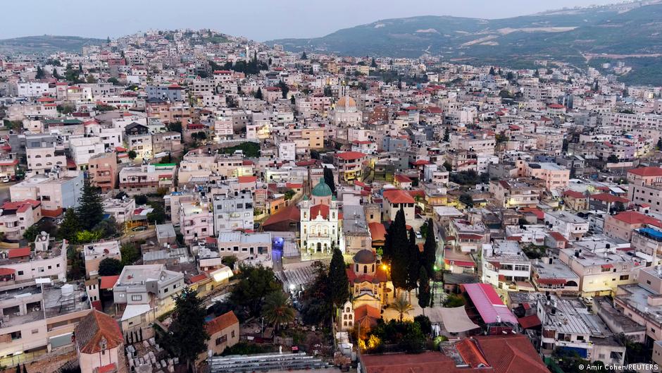 An aerial view shows houses standing in Kafr Kana, a town that some Christians believe is the Biblical town of Cana where Jesus is said to have turned water into wine at a wedding, in northern Israel, 16 March 2021. Picture taken with a drone (photo: REUTERS/Amir)    