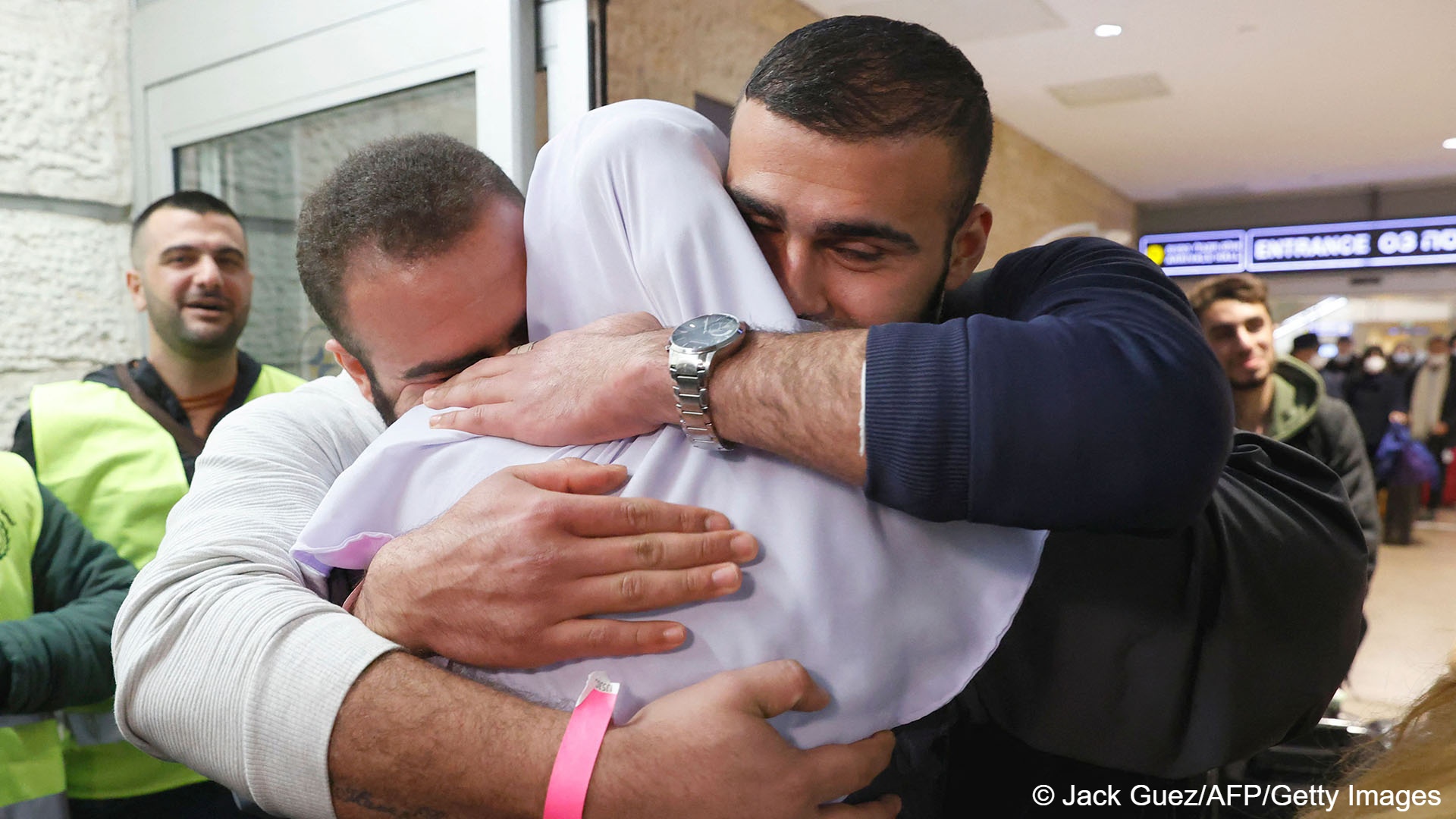 Israeli Arab passengers arriving from Ukraine via the border with Romania on an Israeli ‚Israir‘ rescue flight are welcomed by their family upon arrival at Israel‘s Ben Gurion airport in Lod, near Tel Aviv, on 1 March 2022