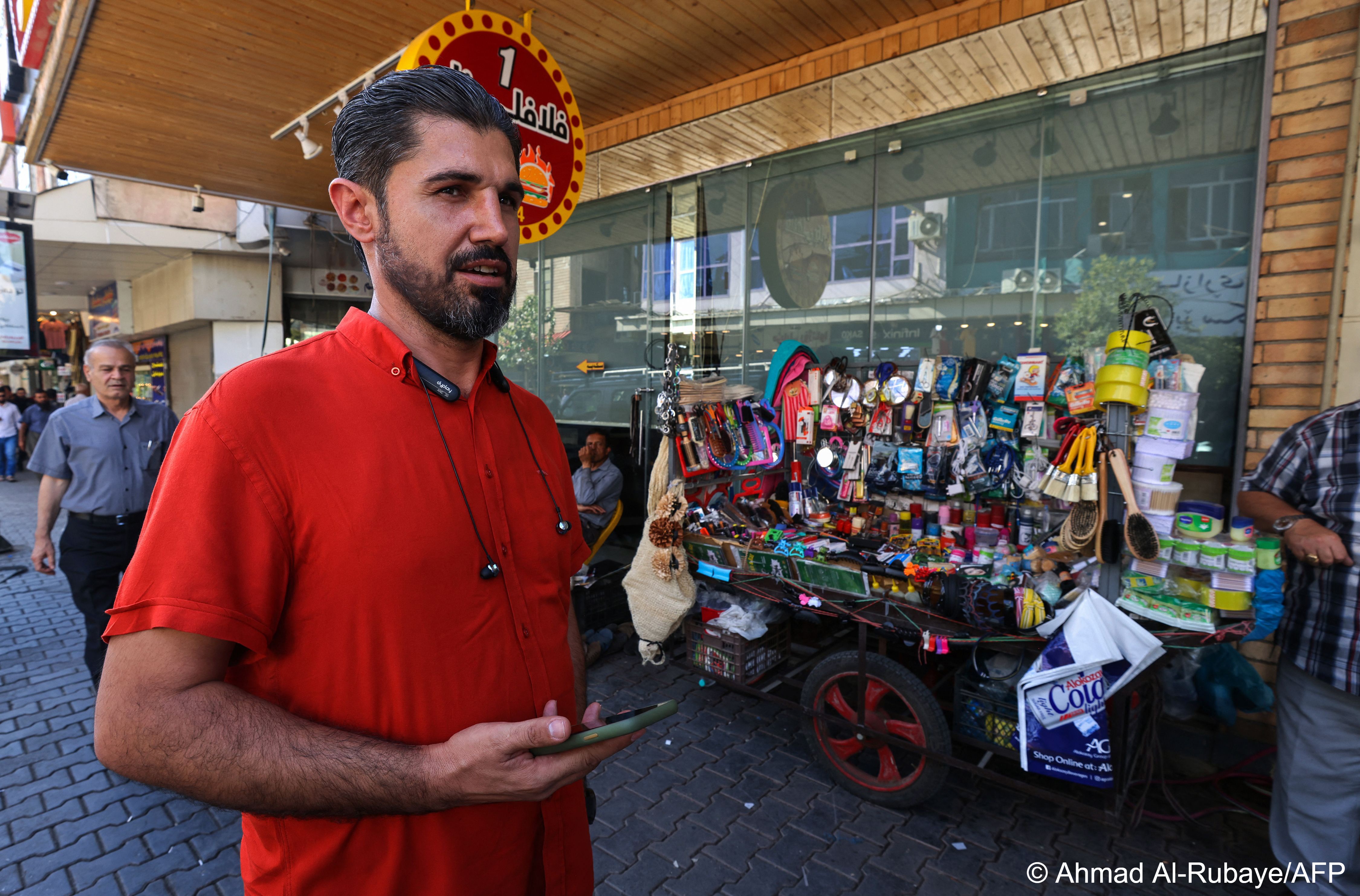 Iraqi Kurd Haresh Talib says he struggles to get paid and his children's schooling is disrupted in his conflict-riddled country.