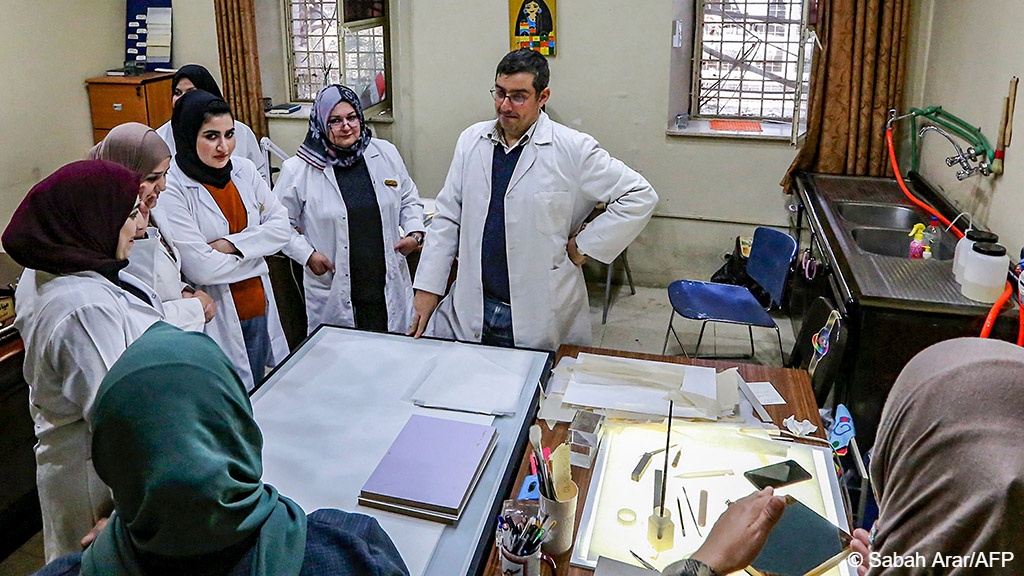  The programme involves working with Italian expert Marco Di Bella (centre) (image: Sabah ARAR/AFP)