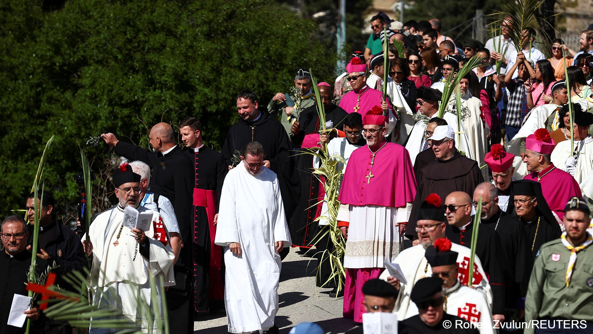 "In Easter, we celebrate the feast of love and life. My wish to all is that love and life can determine our life more than the violence we are living," the Latin Patriarch of Jerusalem, Pierbattista Pizzaballa, said after mass at the Church of the Holy Sepulchre, the site where Christians believe Jesus was crucified and rose from the dead.