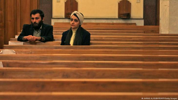 Visitors at the Chaldean Catholic Church of the Assumption of Mary in Baghdad, 8 December 2020 (image: Ahmed al Rubaye/AFP/Getty Images)