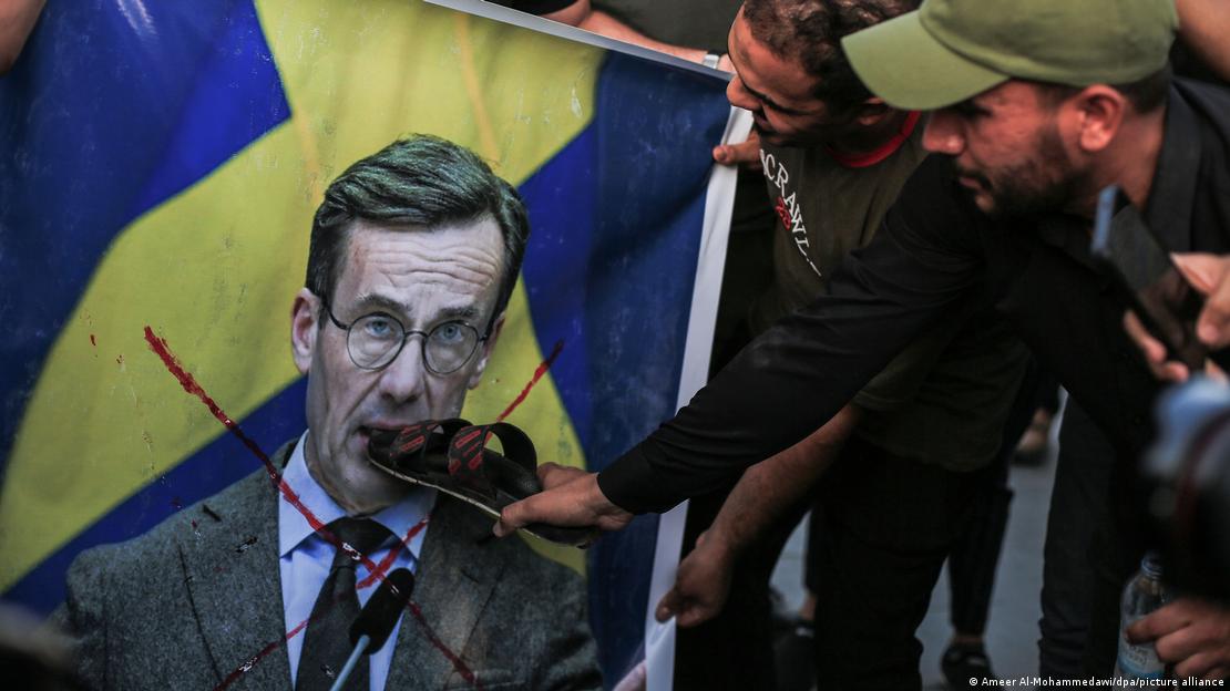 Protestplakat gegen den schwedischen Außenminister Billström in Bagdad Ameer; Foto:  Al-Mohammedawi/dpa/picture alliance 